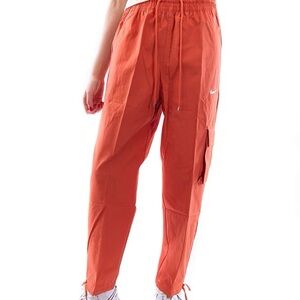 NIKE WOMENS SPORTSWEAR ICON CLASH PANT CANVAS HR
Light Sienna/Healing Orange